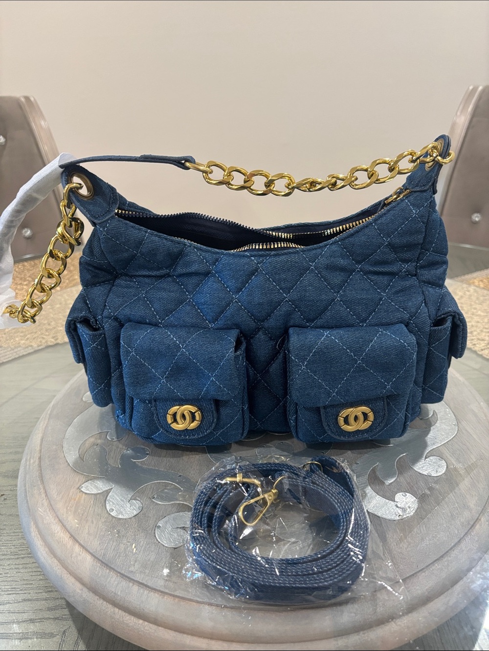 Quilted Navy Denim Shoulder Bag with Gold Chain and crossbody denim strap.